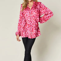 Hot pink printed plus size shirt with V-neck and ruffle-trim balloon sleeves