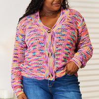 Multicolor v-neck knit cardigan with button-front and long sleeves, ribbed hem