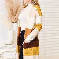 Color-block cardigan with dropped shoulders, cream and brown stripe panel on long sleeves