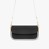 Black mini shoulder bag with front flap and gold chain strap, short curved base