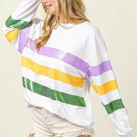 Off-white round-neck sweatshirt with sequined purple, yellow, and green striped panel