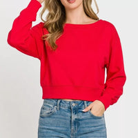 Ruby red cropped boat-neck pullover sweatshirt with long sleeves, ribbed cuffs