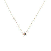 Silver-tone evil eye necklace with tiny blue evil-eye charm on chain