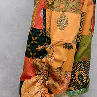 Honey multi patchwork wide-leg pants detail with side drawstring tie and tassel
