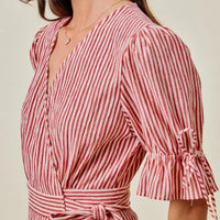 Red and white striped wrap midi dress with short ruffle sleeves and tie waist