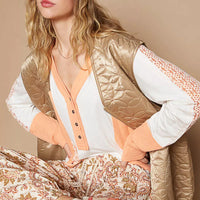 Quilted mocha front-zip vest with V-neck and side pockets