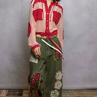 Hooded woven button-down shirt with red-and-blush stripes, chest pockets, drawstring hem