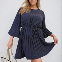 Navy pleated mini dress with tie waist and wide three-quarter sleeves