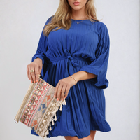 Royal blue pleated mini dress with tie waist and wide cuffed sleeves