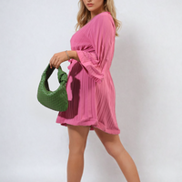 Pink pleated mini dress with tie waist and wide elbow sleeves