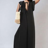 Black wide-leg jumpsuit with V-neck and open back tie straps