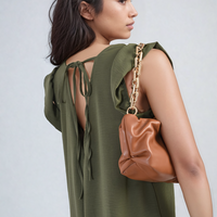 Olive green jumpsuit with V-neck and tied back straps