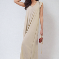 Wide-leg jumpsuit in light beige/cream with V-neck and draped sleeveless bodice