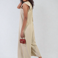 Sleeveless wide-leg jumpsuit in light beige/cream with V-neck