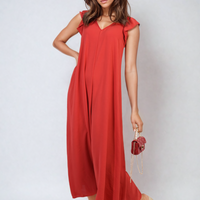 Wide-leg jumpsuit in red with V-neck and short ruffle sleeves