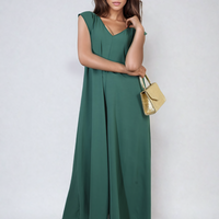 Green wide-leg V-neck jumpsuit with ruffle sleeves, front view