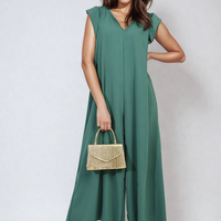 Green wide-leg jumpsuit with V-neck and ruffle sleeves, full-length side view