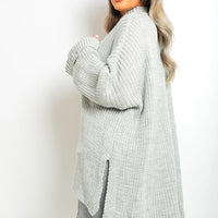 Oversized Jumper in Orange with High Neck and Side Splits