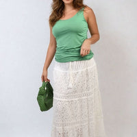 Green scoop-neck tank top with wide shoulder straps