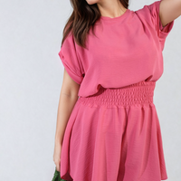 Pink roll-sleeve top and elastic shirred waist shorts co-ord set with gathered waist