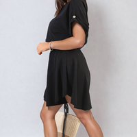 Black roll-sleeve top with shirred waist shorts, side view co-ord set