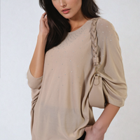 Oversized beige round-neck top with studded speckle detail, gathered cuff sleeves