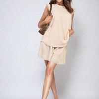 Beige ruffle-trim sleeveless top and matching shorts set with layered hem
