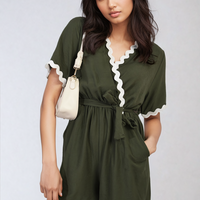 Olive green wrap playsuit with contrast scalloped trim and waist tie