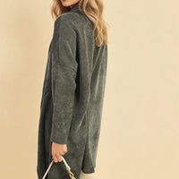 Dark grey open-front long knitted cardigan, loose long sleeves, side asymmetrical hem.