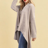 Light grey open-front long knitted cardigan with asymmetrical hemline, long sleeves.