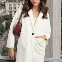 Cream textured button-up jacket with notch collar and flap front pockets