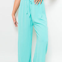Turquoise drawstring gathered-waist wide-leg trousers with ankle-length drape
