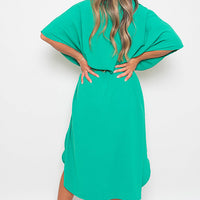 Teal-green button-down collared midi dress with two front pockets and back waist tie