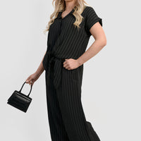 Black striped co-ord set with tie-front top, button placket, and wide-leg trousers