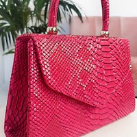 Faux Leather Handbag in Lilac with Top Handle and Chain Strap