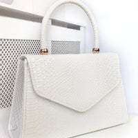 Faux Leather Handbag in Lilac with Top Handle and Chain Strap