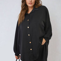 Black oversized collared button-down top, long sleeves, front button placket