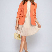 Orange open-front blazer with ruched sleeves and front pockets, 3/4 length sleeves