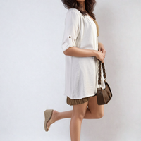 White open-front cardigan with roll-up sleeves and button detail at cuff