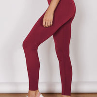 Petite seamless sports leggings, magenta side view with tapered full-length legs