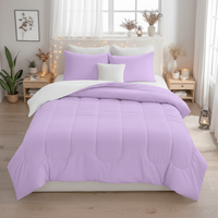 Queen comforter set in pastel lavender with quilted channels and matching pillow shams