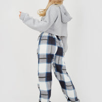 Checked jogger pants in navy, light blue, and white with elastic ankle cuffs