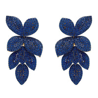 Blue rhinestone cascading flower earrings with gold-tone posts and sparkly petal drops