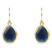 Gold drop earrings with dark blue teardrop faceted gemstone