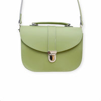 Sage green leather crossbody bag with top handle, flap, and metal clasp