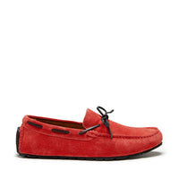 Red suede driving loafer with black laces and a low-profile rubber sole