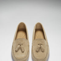 Pair of suede tassel loafers shown from above