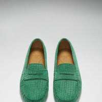 Pair of emerald embossed suede penny loafers, viewed from above