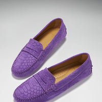 Pair of purple embossed suede penny loafers with tan insoles