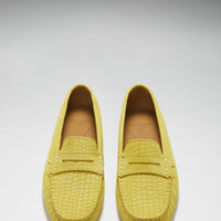Pair of yellow embossed suede penny loafers, viewed from above